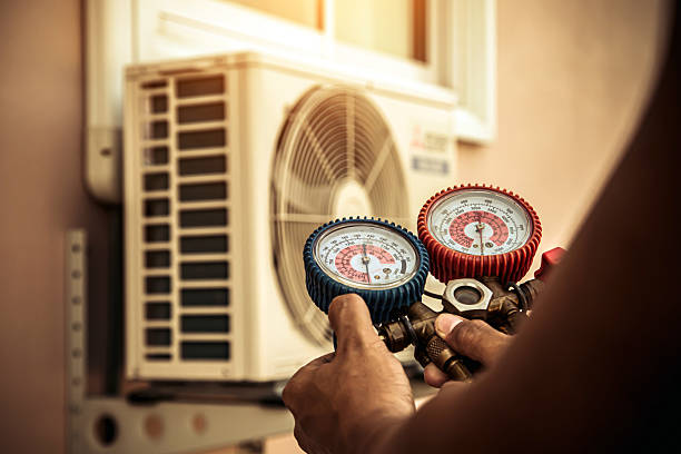 Professional Air Conditioning Service technician working in Rome, GA
